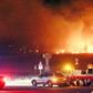 Fanned by strong winds the fire quickly spread through the mountainous area close to the border with North Korea, incinerating 400 homes and 500 hectares of land