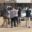 Sudanese protesters take part in an anti-government rally in downtown Khartoum in support of demonstrators detained in the weeks of protests against President Omar al-Bashir's iron-fisted rule