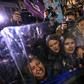 Security forces in riot gear pushed the crowds of women -- some wearing colourful wigs and masks -- at the entrance to the city's main pedestrianised shopping street