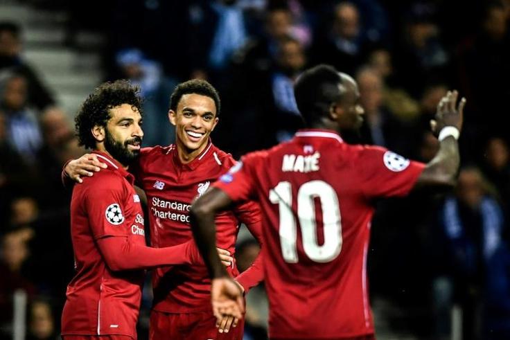 Liverpool players celebrate after Mohamed Salah's goal in their 4-1 win away to FC Porto that took them through to the Champions League semi-finals