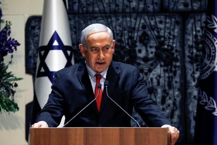 In this file photo, Israeli Prime Minister Benjamin Netanyahu makes an address at the president's residence in Jerusalem on April 17, 2019