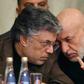 Former Afghan president Hamid Karzai (R) is set to attend this week's meeting in Moscow