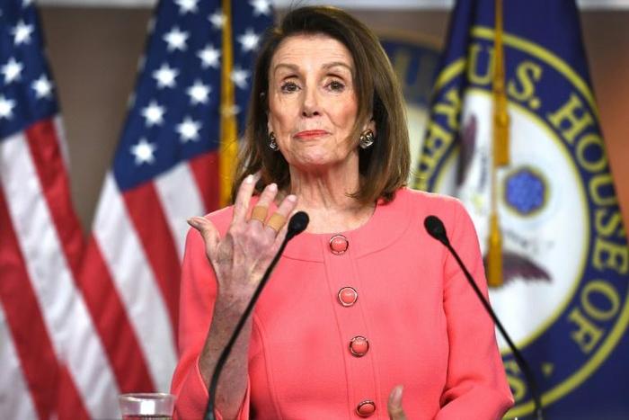 Speaker of the House Nancy Pelosi, pictured at a press conference this month, says she wants the entire Congress to be briefed on Iran by next week ahead of a week-long recess