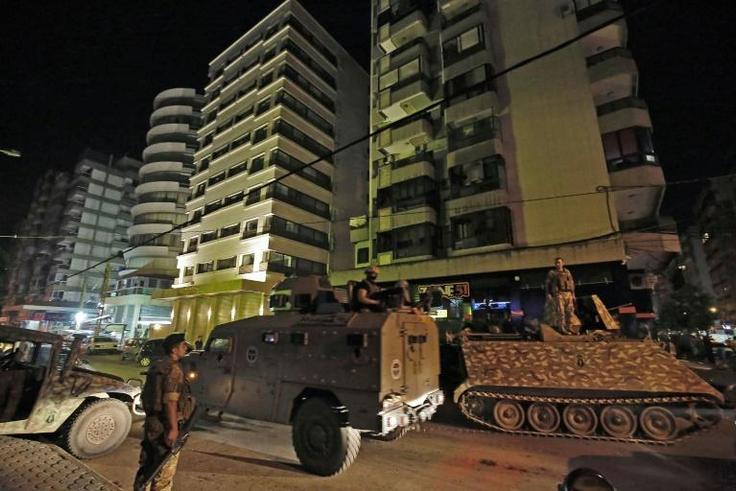 Lebanese troops deploy in numbers after a deadly shooting spree sows panic in the northern port city of Tripoli on the eve of the first day of the Eid al-Fitr holiday