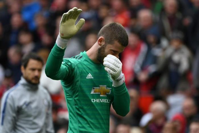 Hands up: David de Gea's error cost Manchester United in a 1-1 draw against Chelsea on Sunday