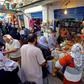 Libyans buy food products at a Tripoli market ahead of the start of the holy Muslim fasting month of Ramadan