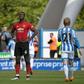 Stunned: Manchester United cannot now qualify for next season's Champions League after a 1-1 draw at relegated Huddersfield