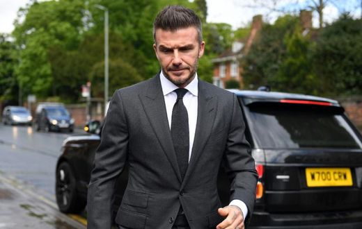 David Beckham, pictured on his way to court this week, cheered Salford into the English Football League as the club he co-owns with Manchester United's famous 'Class of 92' clinched a 3-0 win against AFC Fylde in the National League play-off final on S...