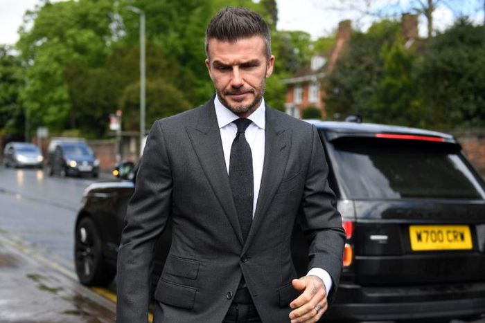 David Beckham, pictured on his way to court this week, cheered Salford into the English Football League as the club he co-owns with Manchester United's famous 'Class of 92' clinched a 3-0 win against AFC Fylde in the National League play-off final on S...