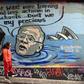 Mural in Melbourne shows Australian Prime Minister Scott Morrison holding a lump of coal as it advertises a rally by students around the world to protest climate change
