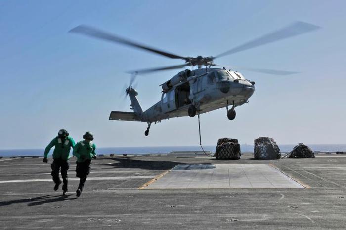 The United States says it is sending 1,500 additional troops to the Middle East to join an aircraft carrier task force and an amphibious assault ship in response to what it calls a "campaign" of attacks approved by Iran's top leadership