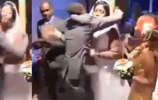 Angry groom beats best man, drags him out of wedding venue for hugging bride too affectionately (video)