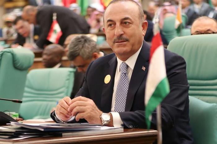 Turkish Foreign Minister Mevlut Cavusoglu attends the opening session of a summit of the 57-member Organization of Islamic Cooperation (OIC) in Mecca