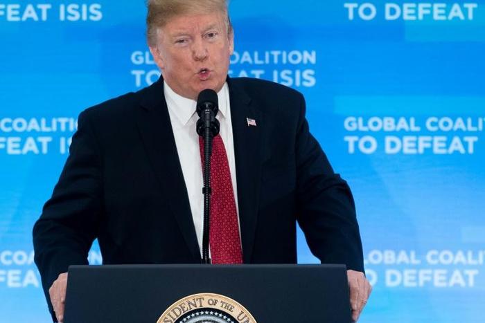 US President Donald Trump speaks at the State Department to officials from more than 70 countries on the fight against the Islamic State group