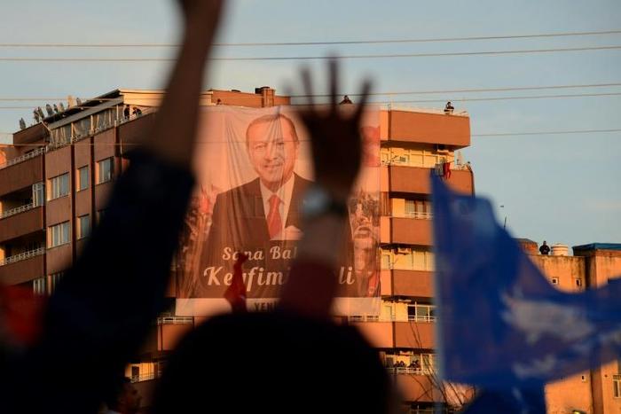With inflation in double digits, the lira weaker and Turkey's economy in recession, analysts say President Erdogan's AKP party faces hurdles in local elections