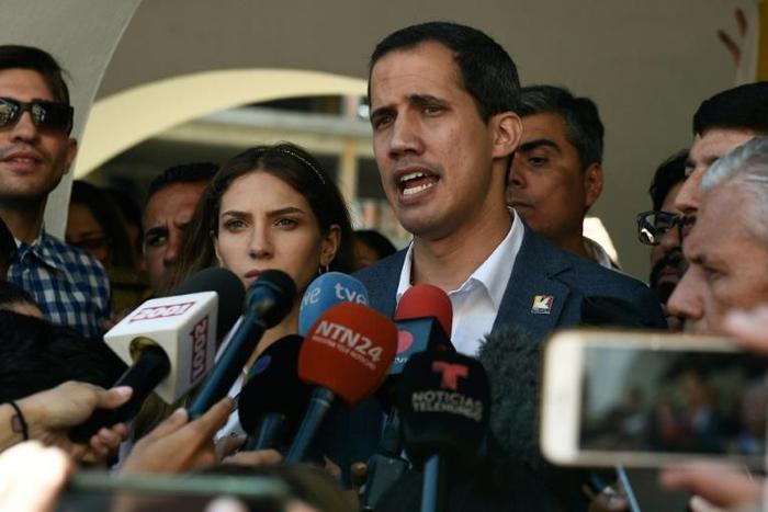 Juan Guaido, Venezuela's National Assembly leader and self-proclaimed acting president, is in a test of wills with President Nicolas Maduro
