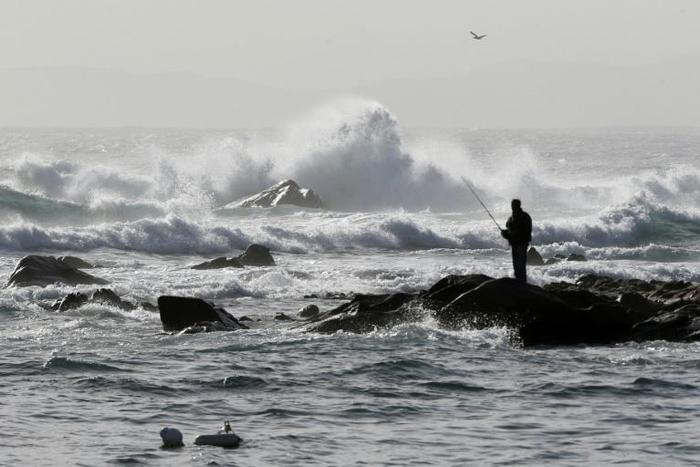 Strong wind whipped up high waves along the coast of Corsica and southeastern France