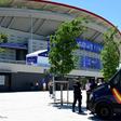 Spanish police officers stand guard outside the Wanda Metropolitan Stadium in Madrid ahead of the UEFA Champions League final football match between Liverpool and Tottenham Hotspur on Saturday