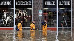 Floodwaters swept into Davenport, Iowa, sending residents scrambling