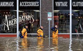 Floodwaters swept into Davenport, Iowa, sending residents scrambling