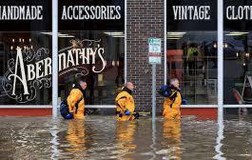 Floodwaters swept into Davenport, Iowa, sending residents scrambling
