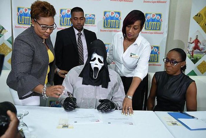Lottery winner turns up in mask to avoid being recognised by money-thirsty relatives