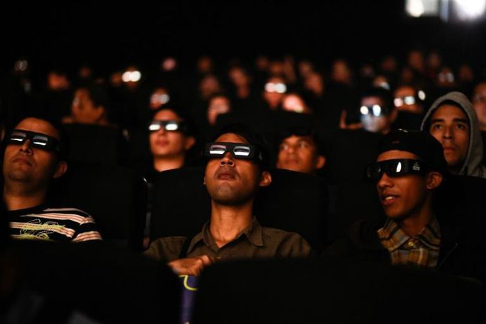 Venezuelan filmgoers watch "Avengers: Endgame" early on April 26, 2019; the superhero film, setting records worldwide, was screened early morning in Caracas to work around blackout issues