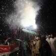 Pakistanis in Karachi celebrate the shooting down of two Indian fighter jets by the Pakistan Air Force