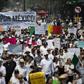 People take part in the so-called "March of Silence" against Mexican President Andres Manuel Lopez Obrador's policies in Mexico City, on May 5, 2019; the economy contracted in the first quarter