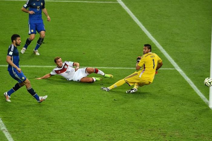 Germany's forward Mario Goetze scores the winner against Argentina in the 2014 World Cup final