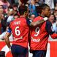 Loic Remy (R) celebrates his goal that should see Lille finish second in France
