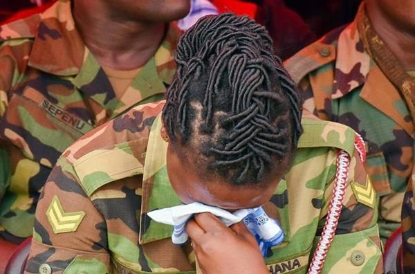 Soldiers cry at Maj Mahama's funeral
