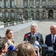 Belgium's Deputy Prime Minister, Minister of Foreign Affairs and Minister of Defence Didier Reynders (L) and former deputy prime minister Johan Vande Lanotte talk to the press after a meeting with the King in Brussels, on May 30, 2019