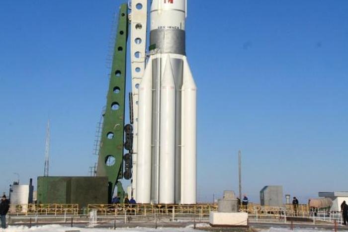 AsiaSat 7, a US-made satellite built for Hong Kong's AsiaSat, sits aboard a Proton-M rocket ahead of launch in Kazakhstan in 2011