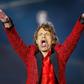 Mick Jagger of the Rolling Stones, pictured during a 2015 US performance, said he is "on the mend" after reportedly undergoing heart valve replacement surgery