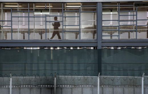 Crowded Plaza, Anxious Migrants and a Bolstered Wall