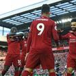 All smiles: Liverpool are back on top of the Premier League after beating Bournemouth 3-0 on Saturday