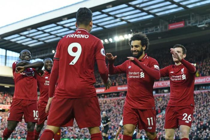 All smiles: Liverpool are back on top of the Premier League after beating Bournemouth 3-0 on Saturday