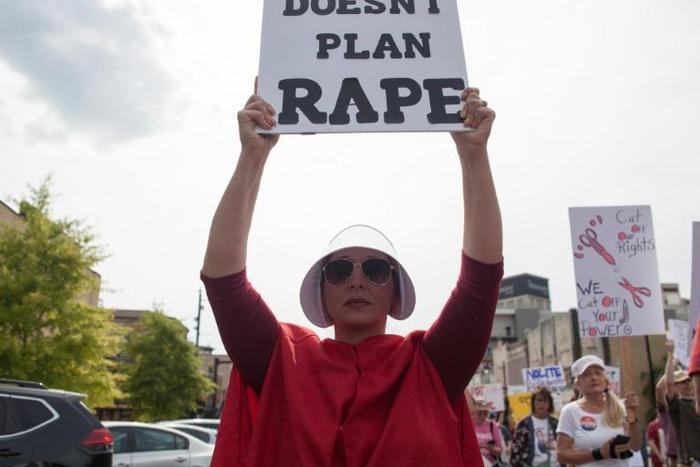 Some of the protesters in Montgomery, Alabama dressed as characters forced to bear children of rape in the dystopian novel and television series "The Handmaid's Tale"
