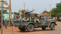 Malian soldiers on patrol in the city of Gao after a deadly suicide car bomb detonated in November 2018
