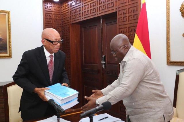 Justice Emile Short presents report to Nana Addo