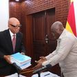 Justice Emile Short presents report to Nana Addo