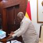 Justice Emile Short presents report to Nana Addo