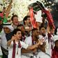 Qatar's players celebrate with the trophy after winning the 2019 AFC Asian Cup final football match between Japan and Qatar at the Zayed Sports City Stadium in Abu Dhabi on February 1, 2019