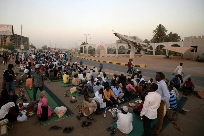 Demonstrators remain camped out in the soaring heat of Khartoum calling for civilian rule three weeks after the military ousted veteran leader Omar al-Bashir