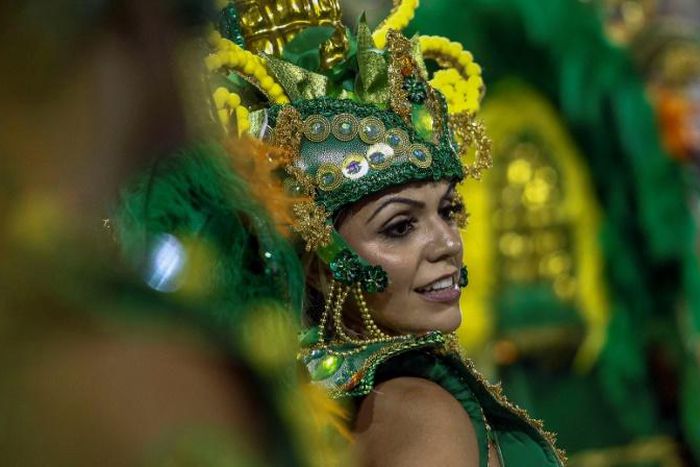 A reveller of "Unidos de Vila Maria" samba school performs during the second night of carnival in Sao Paulo