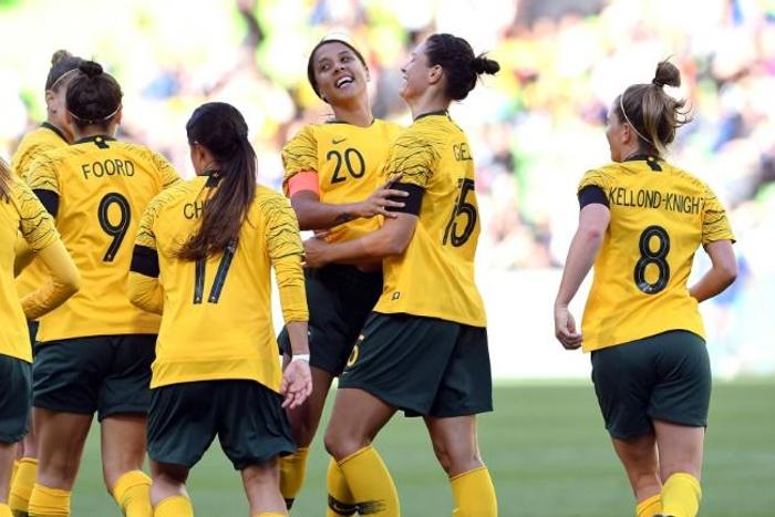 Sam Kerr (C) celebrates with her Australia teammates after scoring against Argentina during the Cup of Nations in Melbourne in March