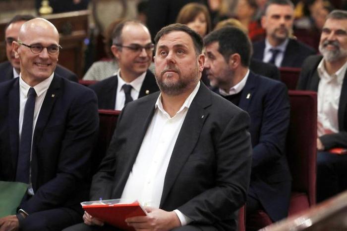 Former Catalan vice president Oriol Junqueras (centre) sits with fellow former Catalan separatist leaders during their trial at the Supreme Court in Madrid on February 12, 2019