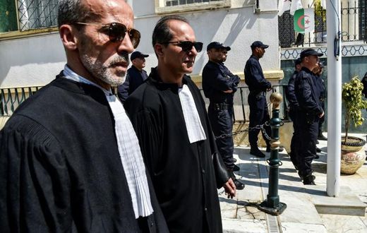 Algerian lawyers and judges gather to support the independence of the judiciary outside the Justice Ministry in Algiers on April 13, 2019. Magistrates who play a key role overseeing the country's elections, say they will boycott a July 4 presidential e...