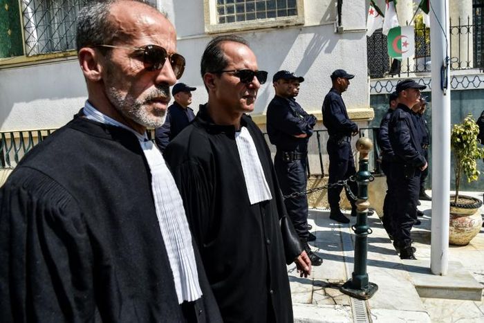 Algerian lawyers and judges gather to support the independence of the judiciary outside the Justice Ministry in Algiers on April 13, 2019. Magistrates who play a key role overseeing the country's elections, say they will boycott a July 4 presidential e...